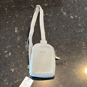 Women’s blue cross body faux leather bag NWT